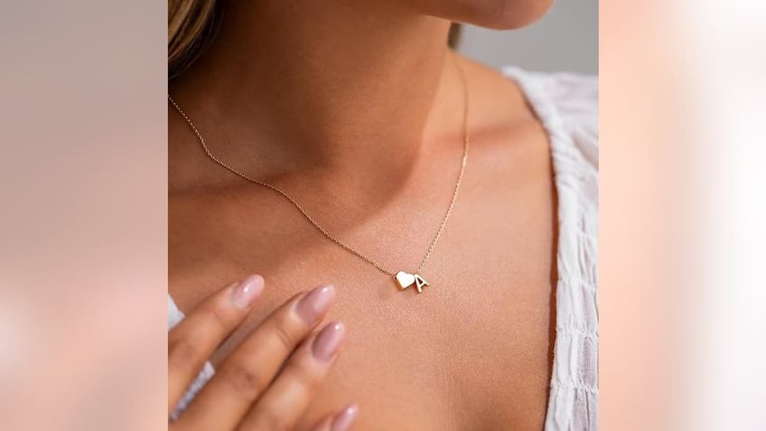 A personalized initial necklace is a timeless gift that can carry sentimental value for years to come.