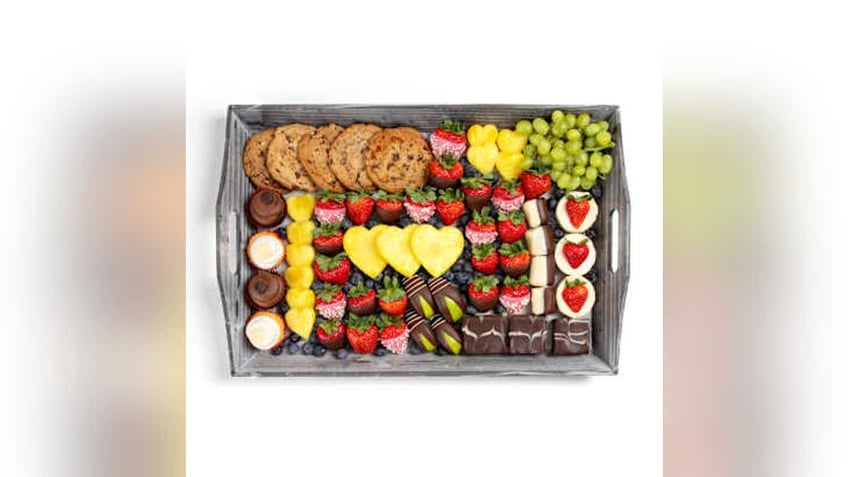 If dessert is on the menu, this heart and soul dessert board at Edible Arrangements will satisfy their sweet tooth.