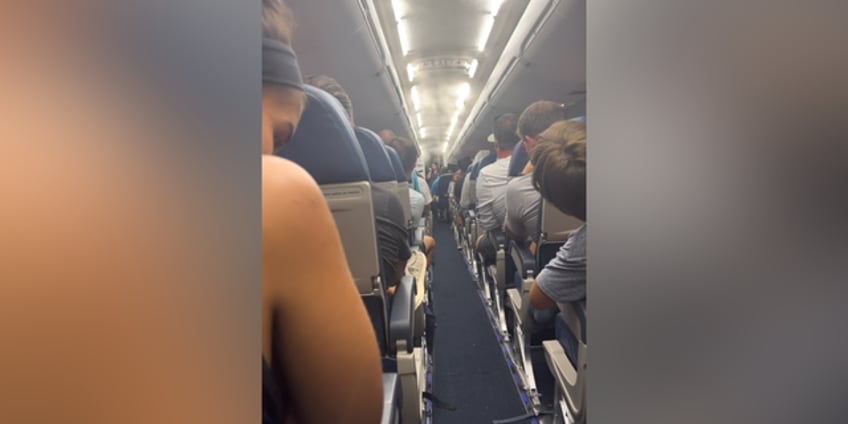 delta airlines passenger says plane stuck on tarmac for hours without food water or bathrooms