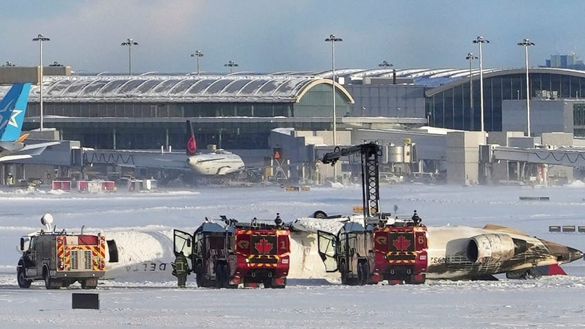 Flipped Delta plane in the snow at Toronto airport