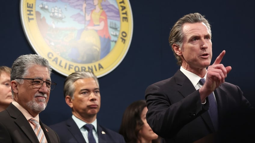 California Gov. Gavin Newsom, pointing