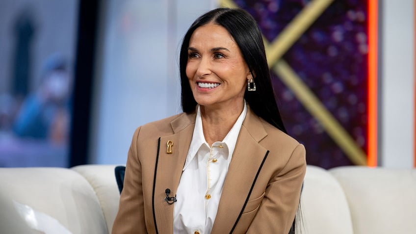 Demi Moore sitting for an interview