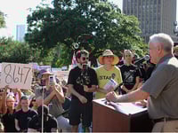 Democrat Congressman Speaks at Texas Capitol During ‘No Kings’ Rally, Protester Waives 8647 Sign in His Face