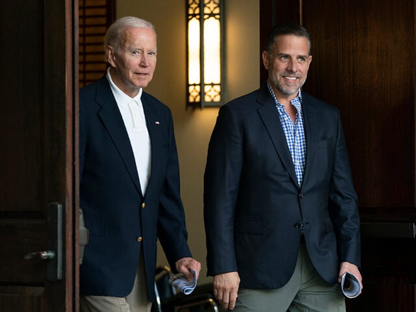 FILE - President Joe Biden and his son Hunter Biden leave Holy Spirit Catholic Church in J