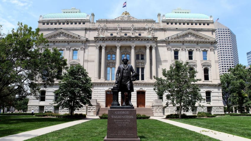 INDIANAPOLIS - JULY 16: George Washington statue stands outside the Indiana State Capitol Building on July 16, 2015 in Indianapolis, Indiana.