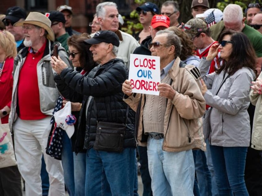 People attend a “close the border” rally in Boston, Massachusetts, on May 4, 2024. Hun