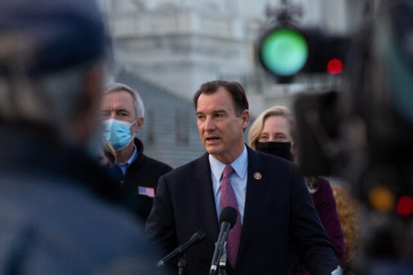 Democrat Tom Suozzi (C) has been elected to replace disgraced Republican congressman Georg