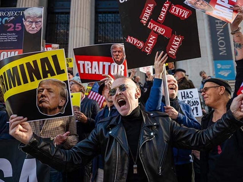 Anti-Trump protesters gather as people line up to see Republican presidential nominee, for