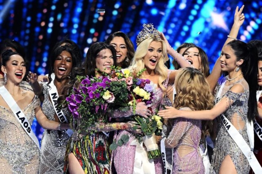 The newly crowned Miss Universe 2024, Victoria Kjaer Theilvig (C) from Denmark is a dancer