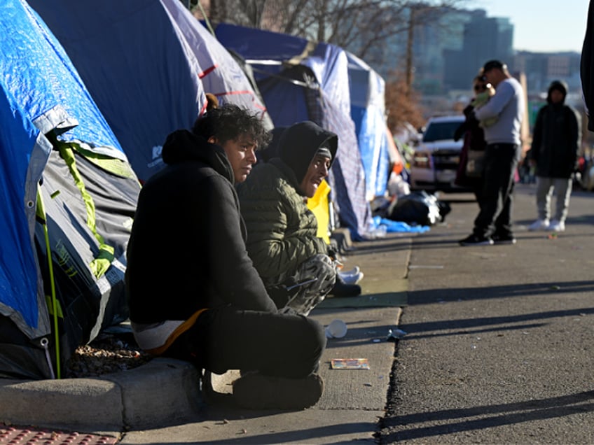 DENVER, CO - JANUARY 3 : People pack and prepare to leave the largest migrant encampment on 27th Ave. between Zuni St. and Alcott St. in Denver, Colorado on Wednesday, January 3, 2024. The City Council has allocated $300,000 for migrant families from this campsite to help cover their first month's rent. (Photo by Hyoung Chang/The Denver Post)