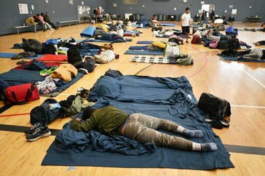 denver starts booting migrants from shelters as city nears breaking point 