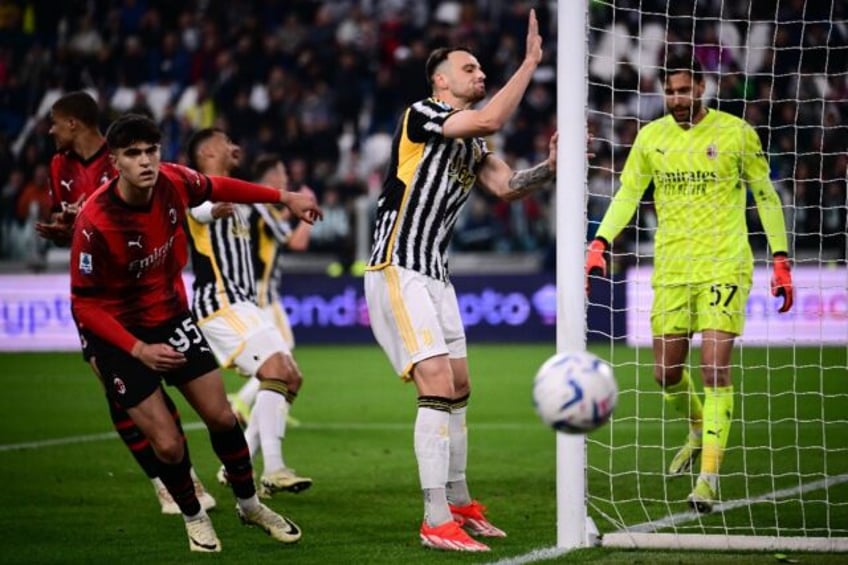 Depleted AC Milan frustrated Juventus