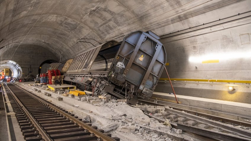 derailment damages close worlds longest rail tunnel until next september