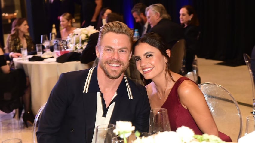 Hayey Erbert smiling with Derek Hough