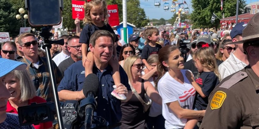 desantis takes aim at trump as 2024 rivals hold competing events at the iowa state fair