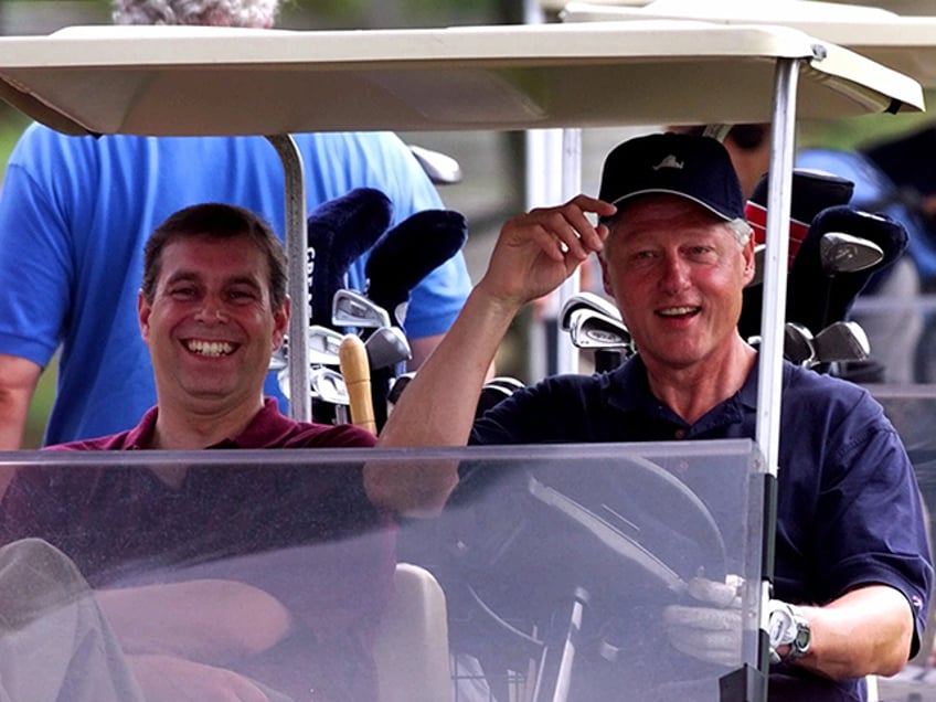 President Clinton, right, heads out to play a round of golf with Prince Andrew, left, at the Farm Neck Golf Club in Oak Bluffs, Mass., on Martha's Vineyard Friday, Aug. 27, 1999. (AP Photo/Greg Gibson)