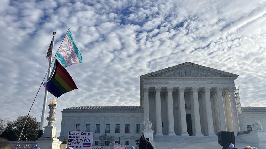 Activists held a rally outside the U.S. Supreme Court building in Washington, D.C., as the court heard oral arguments in the transgender treatments case of <i>U.S. v. Skrmetti </i>on Dec. 4, 2024.