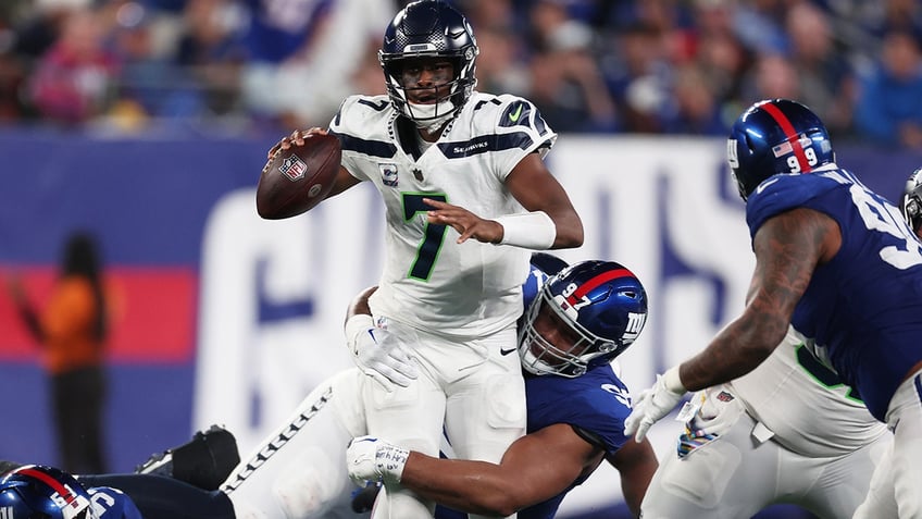 devon witherspoon returns interception 97 yards for td as seahawks blast giants daniel jones