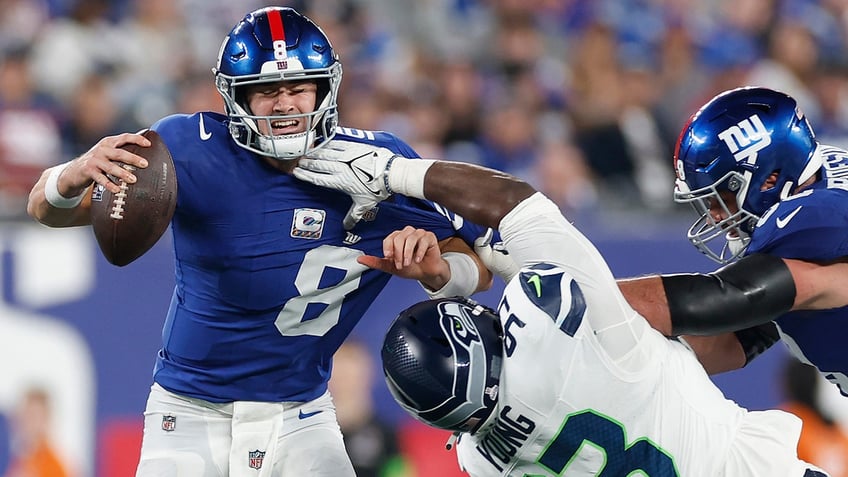 devon witherspoon returns interception 97 yards for td as seahawks blast giants daniel jones