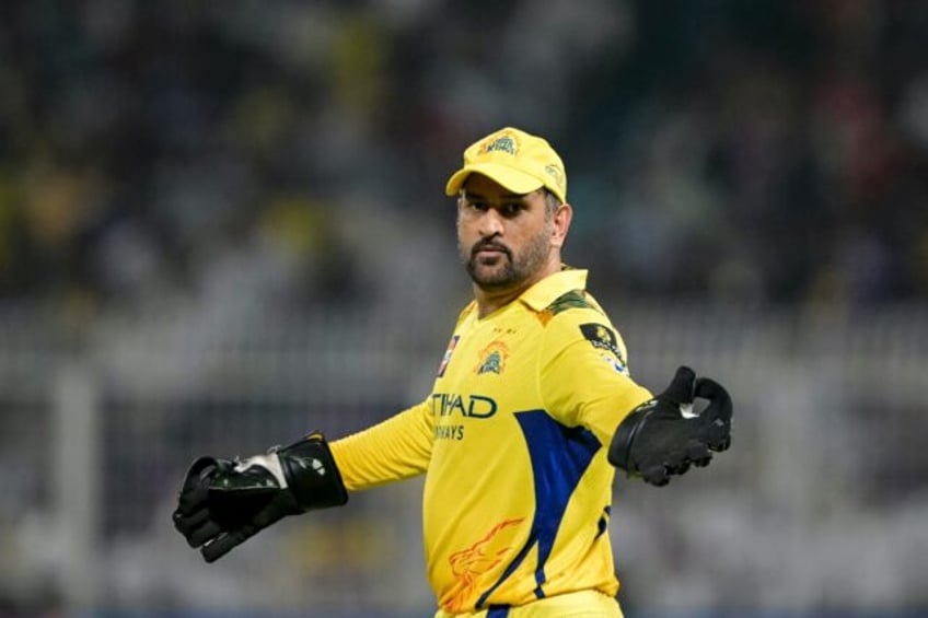 Chennai Super Kings' captain Mahendra Singh Dhoni gestures during the match against Kolkat