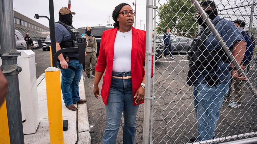 Iver going through gate at detention facility
