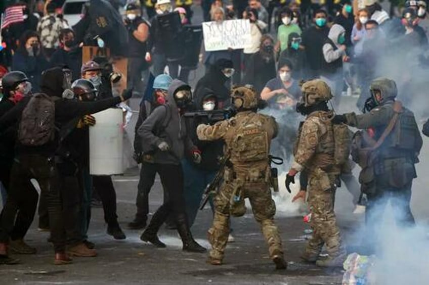 dhs respond after violent rioters storm ice facility assault law enforcement officers