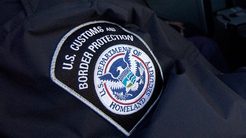 Officer Eric Darnsteadt from the United States Customs and Border Protection service inspects the contents of shipping containers with a truck mounted X-ray machine arriving at Port Newark from all around the world, in Newark, New Jersey February 24, 2006. Powerful Washington lawmakers citing security concerns are pushing emergency legislation to block a controversial deal that would place management of six major U.S. ports in the hands of a state-owned Arab company. REUTERS/Chip East - RTR16LYP