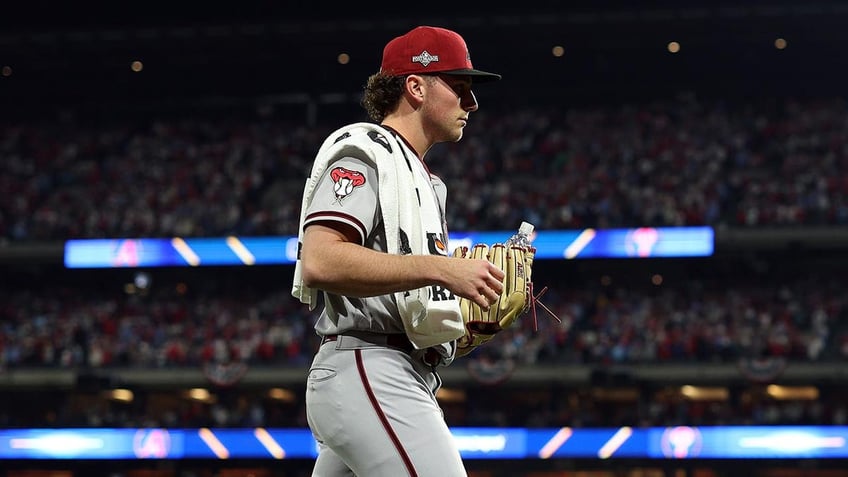 diamondbacks brandon pfaadt appears to read bible before taking mound in game 7 of nlcs