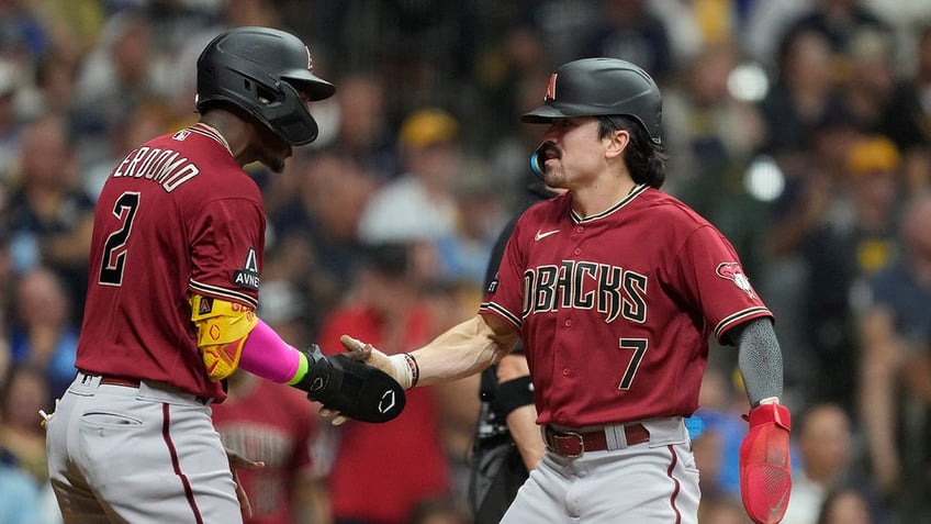 diamondbacks earn date with nl west rival dodgers after sweeping brewers in wild card series