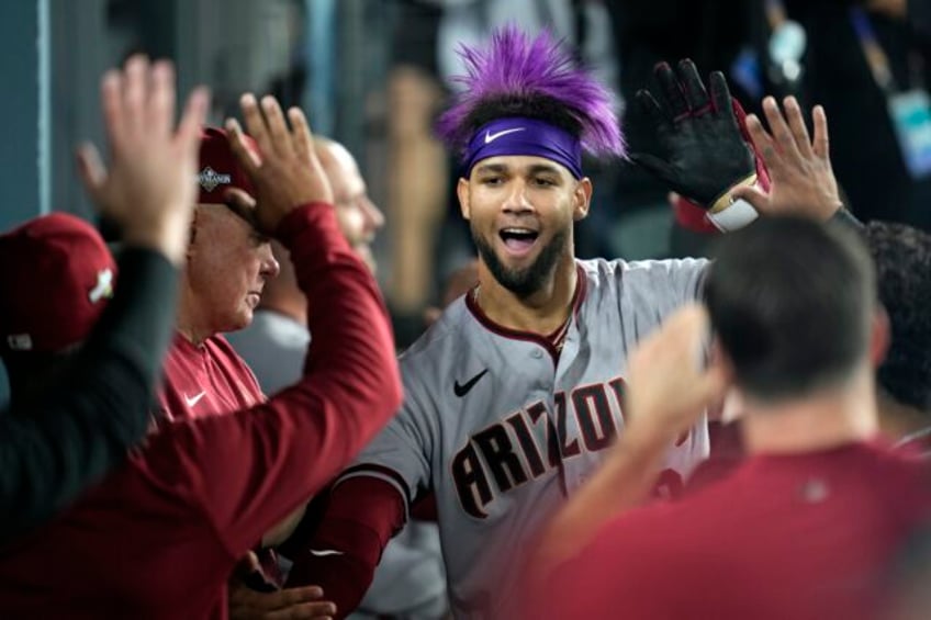 diamondbacks jump all over another dodgers starter and beat la 4 2 for a 2 0 lead in nlds