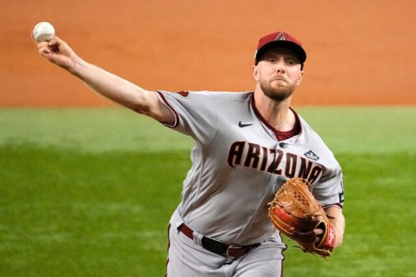 diamondbacks rout rangers to pull level in world series