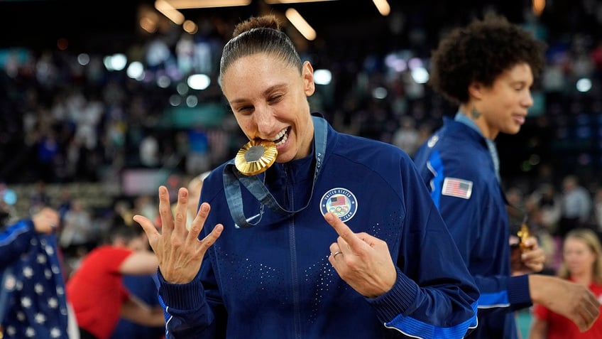 Diana Taurasi celebrates Olympic gold