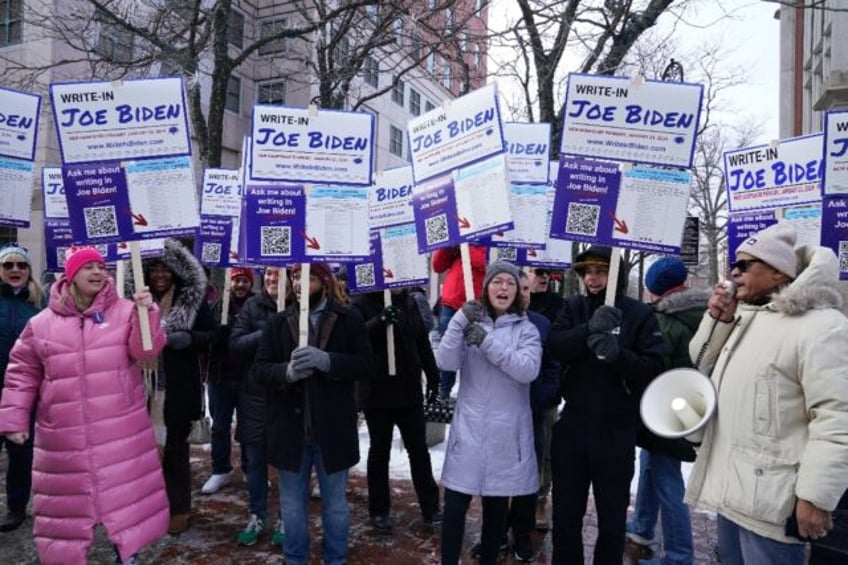 Supporters demonstrate at a Joe Biden Write-In Rally in Manchester, New Hampshire, on January 20, 2024