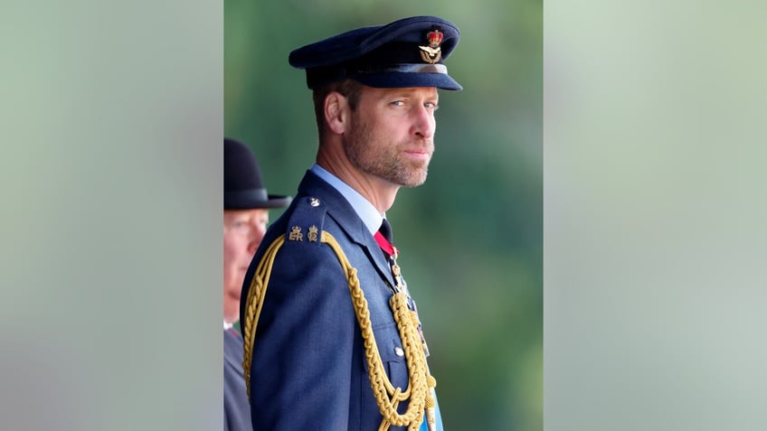 Prince William in his military uniform looking to the side.