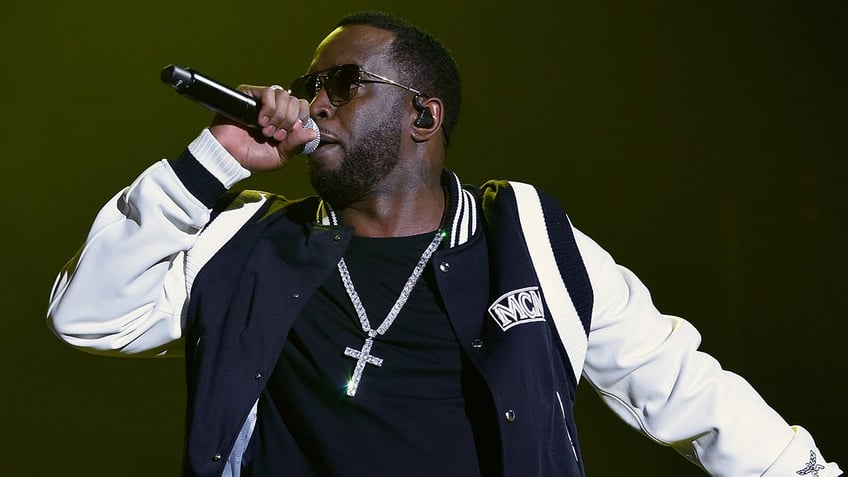 Diddy performs on stage