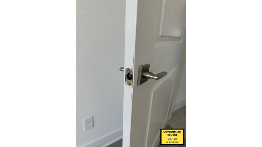 Evidence in Diddy's trial shows damage done to a bedroom door.