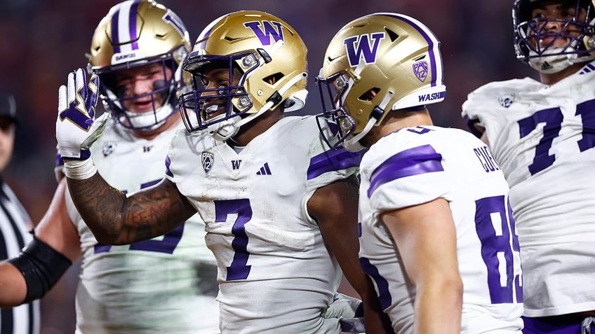 dillon johnsons career night carries washington in epic high scoring affair over usc