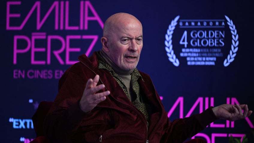 Director Jacques Audiard speaks at an event