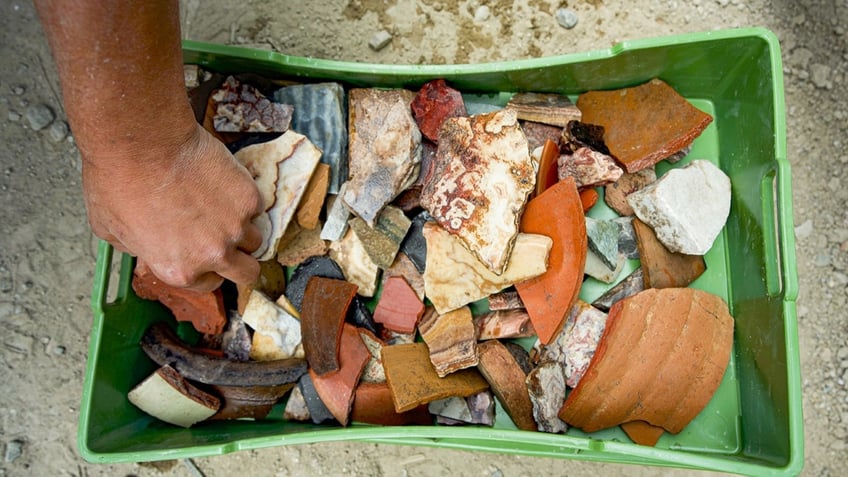 Bucket full of ceramics