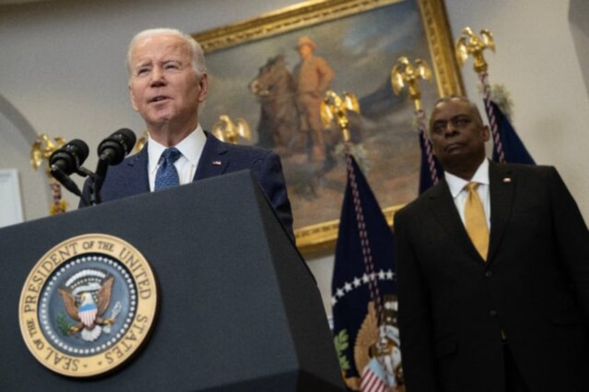 US President Joe Biden, with Defense Secretary Lloyd Austin, speaks about the continued support of Ukraine in its fight against Russia, in the Roosevelt Room of the White House in Washington, DC, on January 25, 2023. The US announced January 25 that it will provide 31 Abrams tanks to help …