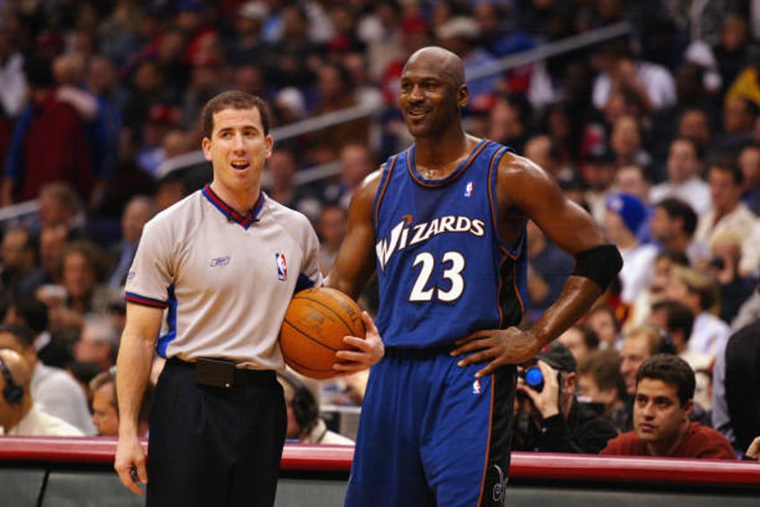 Michael Jordan of the Washington Wizards talks with referee Tim Donaghy during the game against the Los Angeles Clippers on February 12, 2003 at...