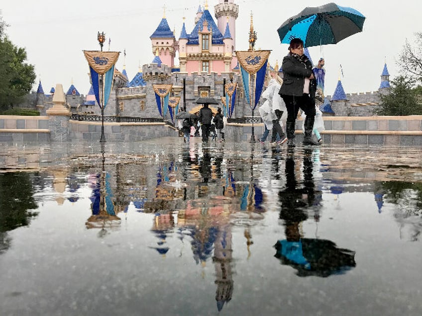 disney hiking prices on theme parks as much as 21 percent as attendance falters