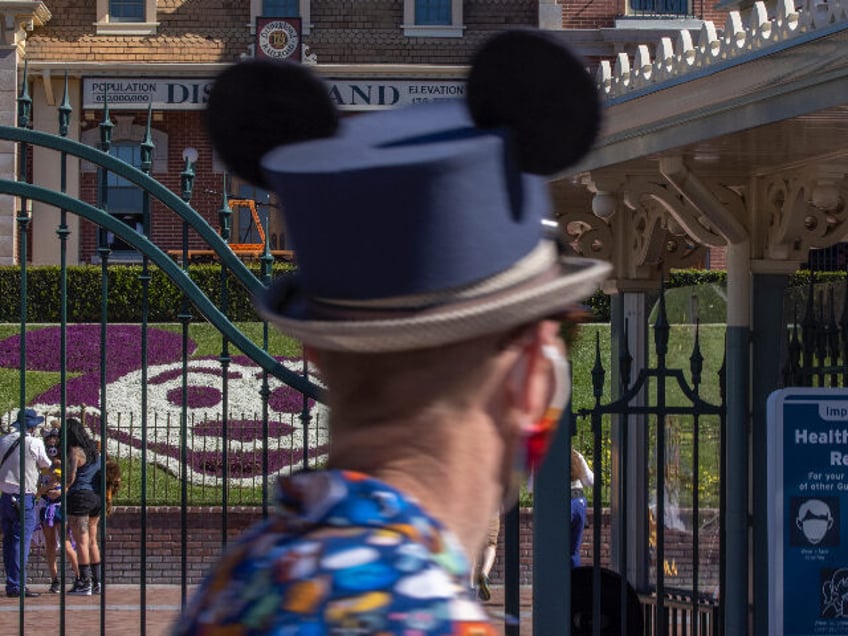 ANAHEIM, CA - APRIL 30: People are required to follow COVID-19 safety protocol at Disneyla