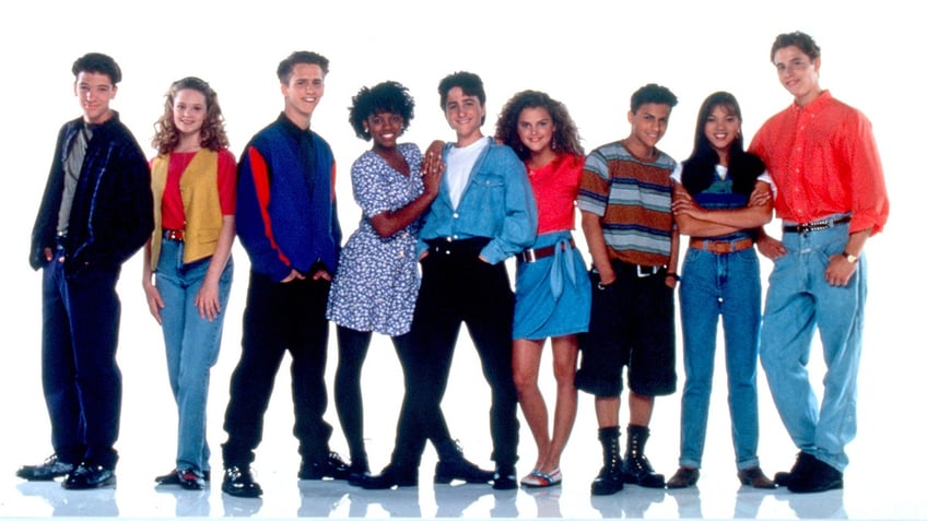 J.C. Chasez from NSYNC on the left and Kerri Russell 6th from the left in a picture with the cast of "The All New Mickey Mouse Club"