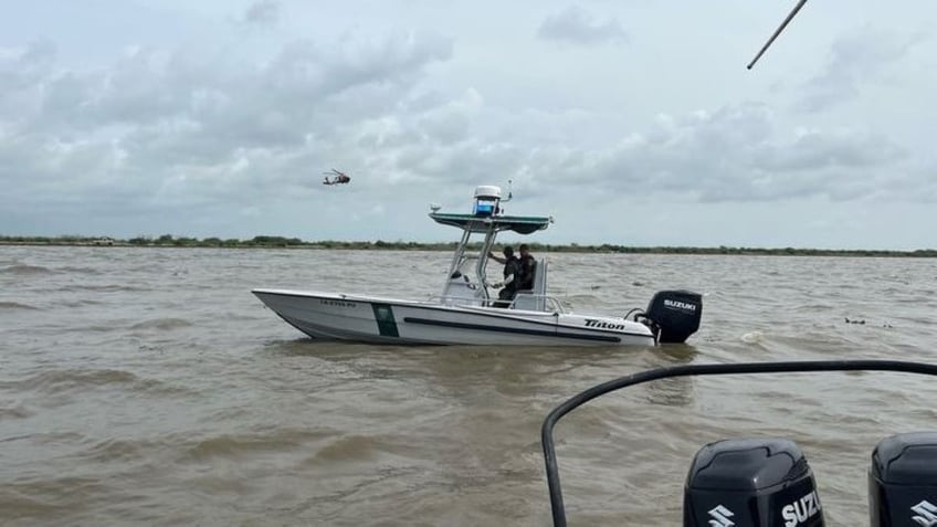 Image of stranded boat in water