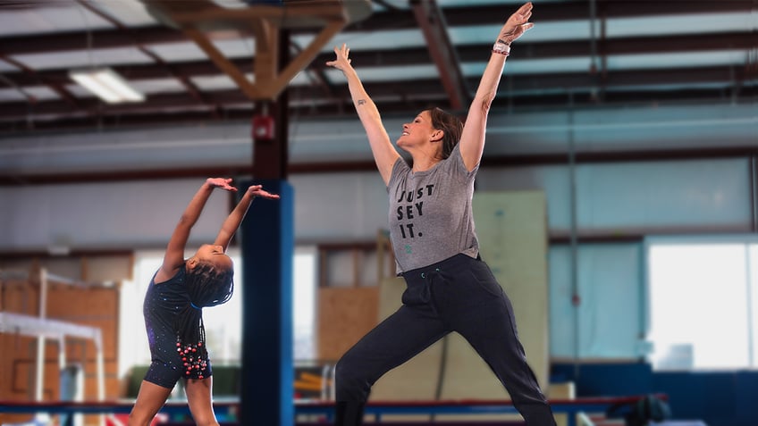 Jennifer with young female gymnast