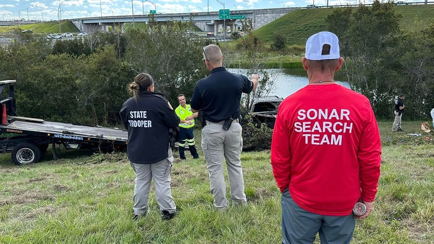 Florida Highway Patrol on the scene of the van recovery