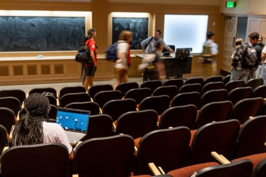 Students are seen in a lecture hall at the University of Texas at Austin in February 2024