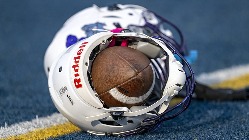 Football in helmet