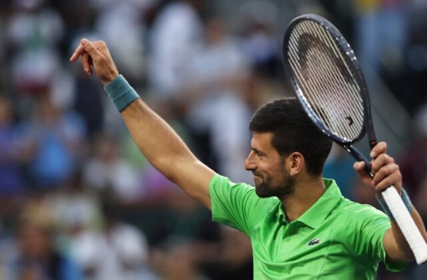 Top-ranked Novak Djokovic of Serbia celebrates a victory over Aleksandar Vukic of Australi